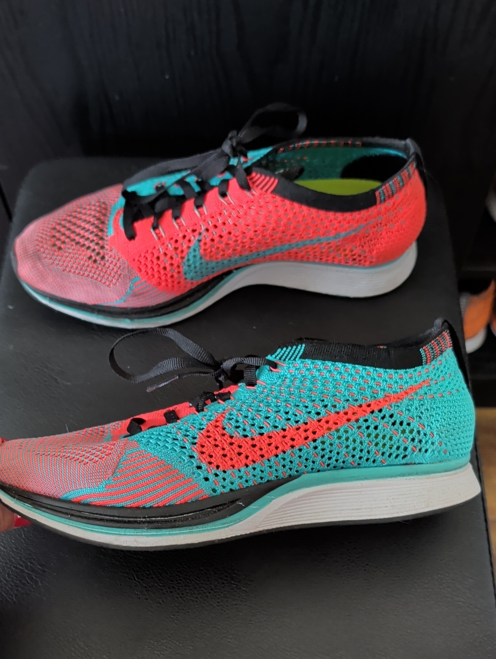 Nike Flyknit Racer Women’s Sneakers in Teal and Coral
